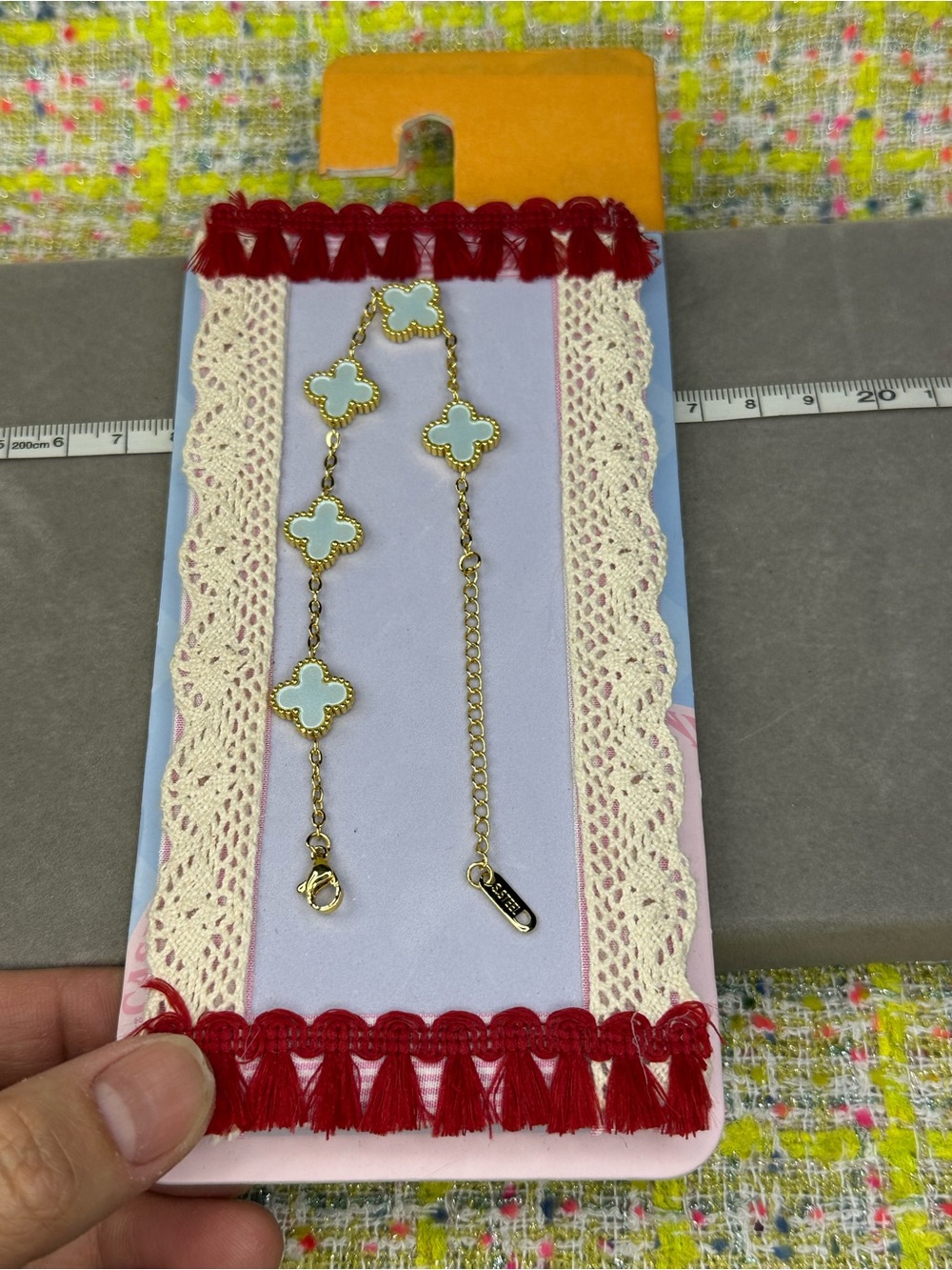Gold Chain Bracelet with Light Blue Clover Motifs